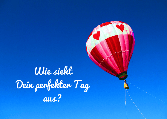 Blogbeitrag - Hast Du Lust, Dir Deinen perfekten Tag zu kreieren? - Bei strahlend blauem Himmel fährt ein Heißluftballon in den Farben rot, pink udn weiß. Im Foto steht geschrieben - Wie sieht Dein perfekter Tag aus?